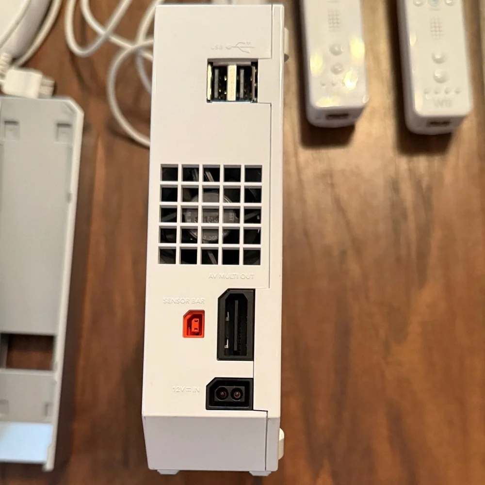 Nintendo Console with White and Gray Accessories